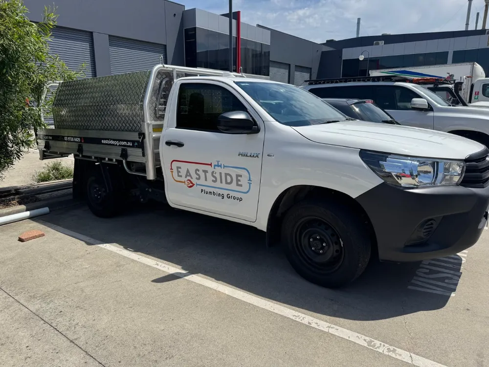 Branded Eastside Plumbing Group Hilux service ute
